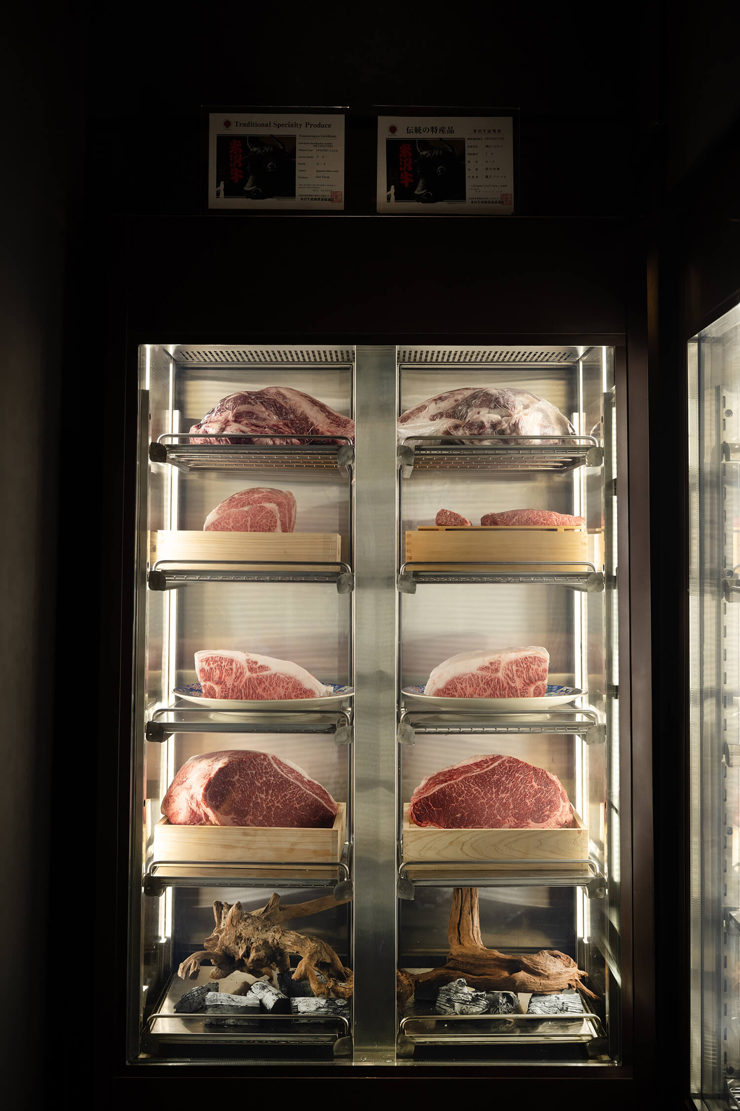 Refrigerated display of marbled Wagyu cuts at Togyushi